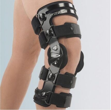 Ginocchiera funzionale rigida short in alluminio modellabile con fibbie di fissaggio delle fasce a strappo in acciaio. Imbottiture e cuscinetti di appoggio in morbido vellutino grippante Snodo policentrico con regolazione mediante stop con viti di fiss